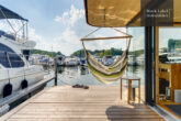 Ihr schwimmendes Traumhaus als luxuriöses Hausboot vereint moderne Architektur und Nachhaltigkeit - Terrasse vorn