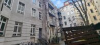 Top gelegene vermietete Wohnung mit Balkon - Innenhof