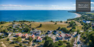 Nachhaltiges Küstenleben: Modernes Loft mit Terrasse und Blick auf die Ostseein Ostseenähe - Lage Hintergrund Suedstrand